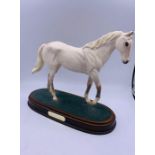 Royal Doulton "Desert Orchid" figure on plinth