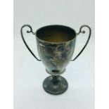 A silver two handled cup, engraved and hallmarked Birmingham