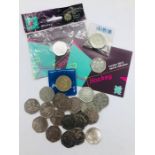 A selection of collectable 50p coins and £2 coins including Royal Mint 2012 sports collection
