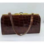 A Brown Crocodile leather handbag