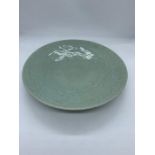 An Antique Chinese Celadon sage porcelain plate with a floral pattern