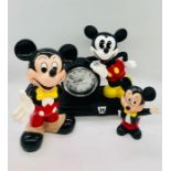 Three collectable Mickey Mouse figures including a Clock