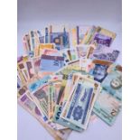 One Hundred Worldwide Bank Notes mixed condition.