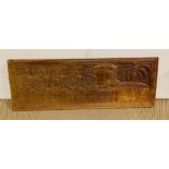 A carved hardwood panel depicting Benin Warriors measuring 123cm x 43cm
