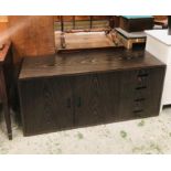 A contemporary Wenge sideboard with four drawers and two cupboards (H71cm L158cm D52cm)