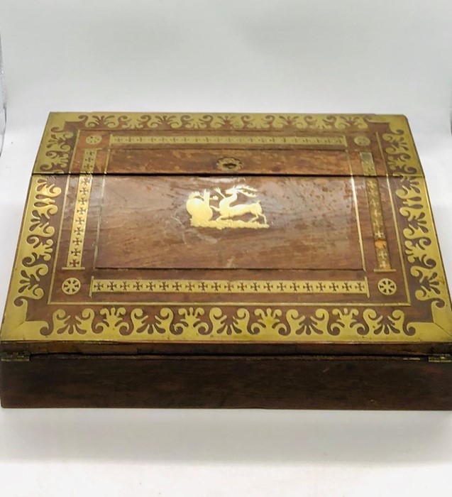 A wooden writing slope with decorative brass inlay AF