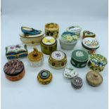 A selection of porcelain collectable pill or trinket boxes
