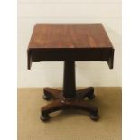 A mahogany drop leaf hall table on a pedestal base with bun feet (H70cm D46cm W54cm/90cm)