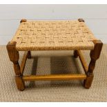 Small oak stool with seagrass seat