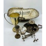 A selection of silver plated items to include a trophy and handled basket etc