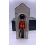 A Boxed Sentry themed decanter by Masons.