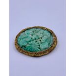 A Chinese jade and gold Brooch with floral design