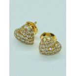 A pair of Heart shaped Cartier earrings with pave diamonds in original box and with original