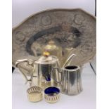 A selection of white metal items to include tray, teapot etc