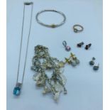 A selection of silver and costume jewellery.