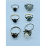 A selection of five silver fashion rings