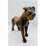 A French Antique leather dog (25cm High and 35cm nose to tail)