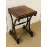 A regency rosewood sewing table circa 1820