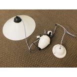 A cream porcelain pendant light with celling fixture