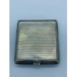 A Birmingham Hallmarked silver cigarette case