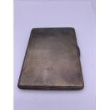 A silver cigarette case, hallmarked London 1946 by PB & S