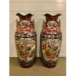 A pair of large Chinese style vases with gilt handles standing 63cm tall