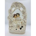 A large late Victorian flat back Staffordshire figurine