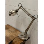 An anglepoise lamp of a modern design
