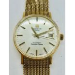 A Gents Tissot watch on a 9ct gold strap, watch not working