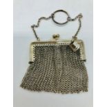White metal Ladies mesh purse with finger chain and charm