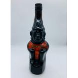 A decorative Pisco Licor de Los Incas bottle (empty)