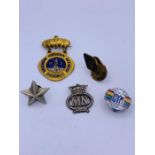 Assorted pins including NUS