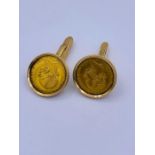 A pair of Gents cuff links made from Austrian 8 Florin coins in yellow gold mounts marked 585