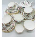 A Wedgwood tea set for eight settings to include two extra saucers in Hathaway Rose