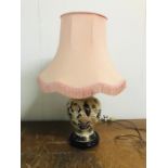 A Chinese vase lamp base with pink fringed lamp shade