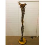 A very ornate gold and silver "Fallen Angel" floor standing lamp approx. 211cm tall