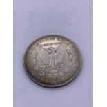 An 1885 US Morgan Silver Dollar