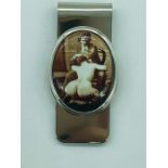 A Silver Clip with nude pictorial image