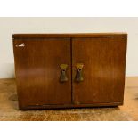 An art deco style wooden table cutlery drawers with two doors