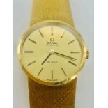 An 18ct yellow gold Omega Ladies watch with original paperwork (original box is as found)