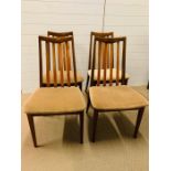 Four stick back G Plan dining chairs