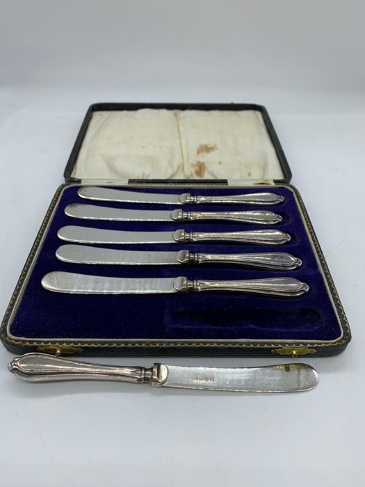 A Boxed set of six butter knives with silver hallmarked handles. - Image 2 of 2