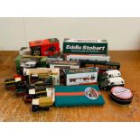 A selection of Eddie Stobart toy cars, lorries and notepads