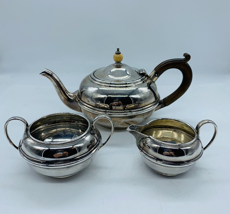 A Batchelor silver tea set comprising teapot, sugar bowl and milk jug (464g)