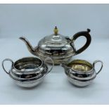 A Batchelor silver tea set comprising teapot, sugar bowl and milk jug (464g)