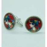 A pair of silver and enamel Renaissance style cufflinks