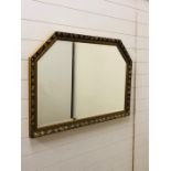 A gilt framed bevelled mirror (approx. 100cm x 70cm)