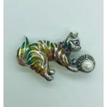 A silver Plique a Jour cat brooch with pearl ball.
