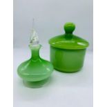 Two pieces of green glass dressing tableware