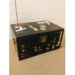 A hand painted Chinese wooden chest with brass fixings (H34cm D43cm W66cm)